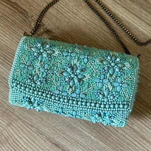 Turquoise beaded Anthro clutch